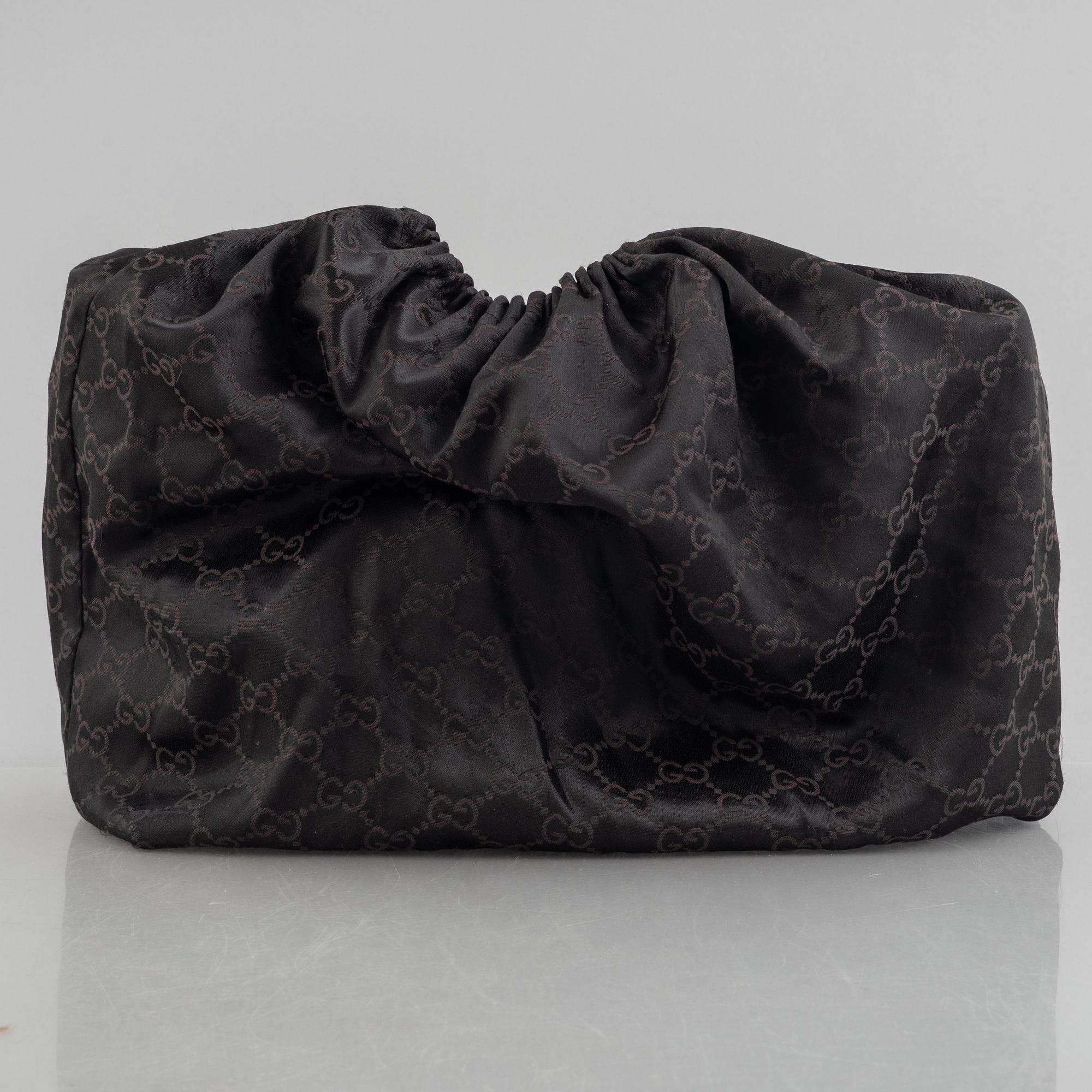 Gucci, A monogram canvas tote bag.