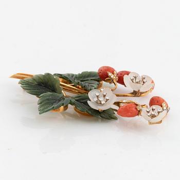 A Paltscho brooch and a pair of earrings.