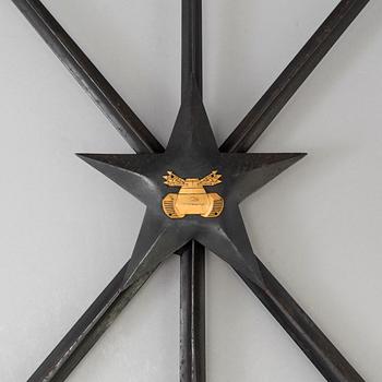 A pair of steel wall sconces made from bayonets, 20th Century.