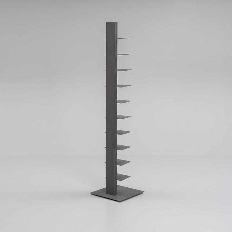 A grey lacquered metal shelf, contemporary production.