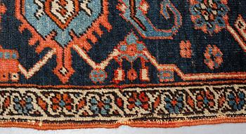 A carpet, an antique Heriz, ca 469,5-471 x 300-309,5 cm.