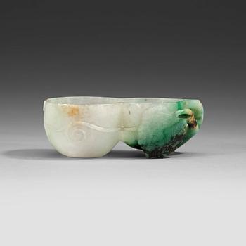 127. A carved nephrite brush washer, late Qing dynasty (1644-1912).