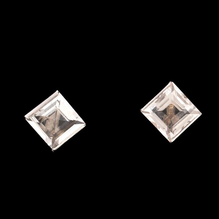 A pair of silver earrings set with step-cut rock quartz crystal by Wiwen Nilsson, Lund 1943.