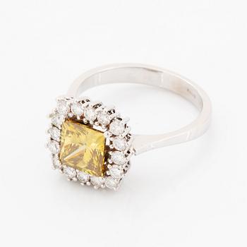 Princess-cut colour treated fancy deep brown-yellow diamond ring.