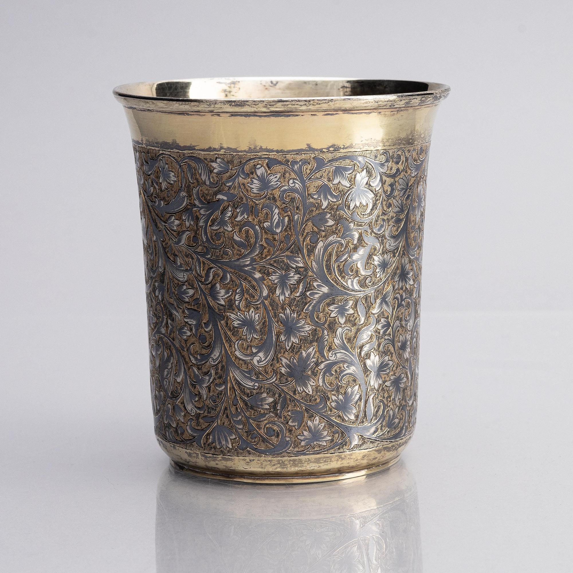 A Russian silver-gilt beaker with niello, unidentified maker A.K., assay master Michael Chumazov, Moscow 1846.