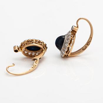 A pair of 14K gold earrings with sapphires and diamonds ca. 0.51 ct in total. A R Weckman, Helsinki 1925-50.