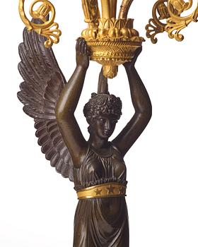 A pair of French  Empire five-light candelabra, sign. Rabiat, bronze maker in Paris 1756-1815.