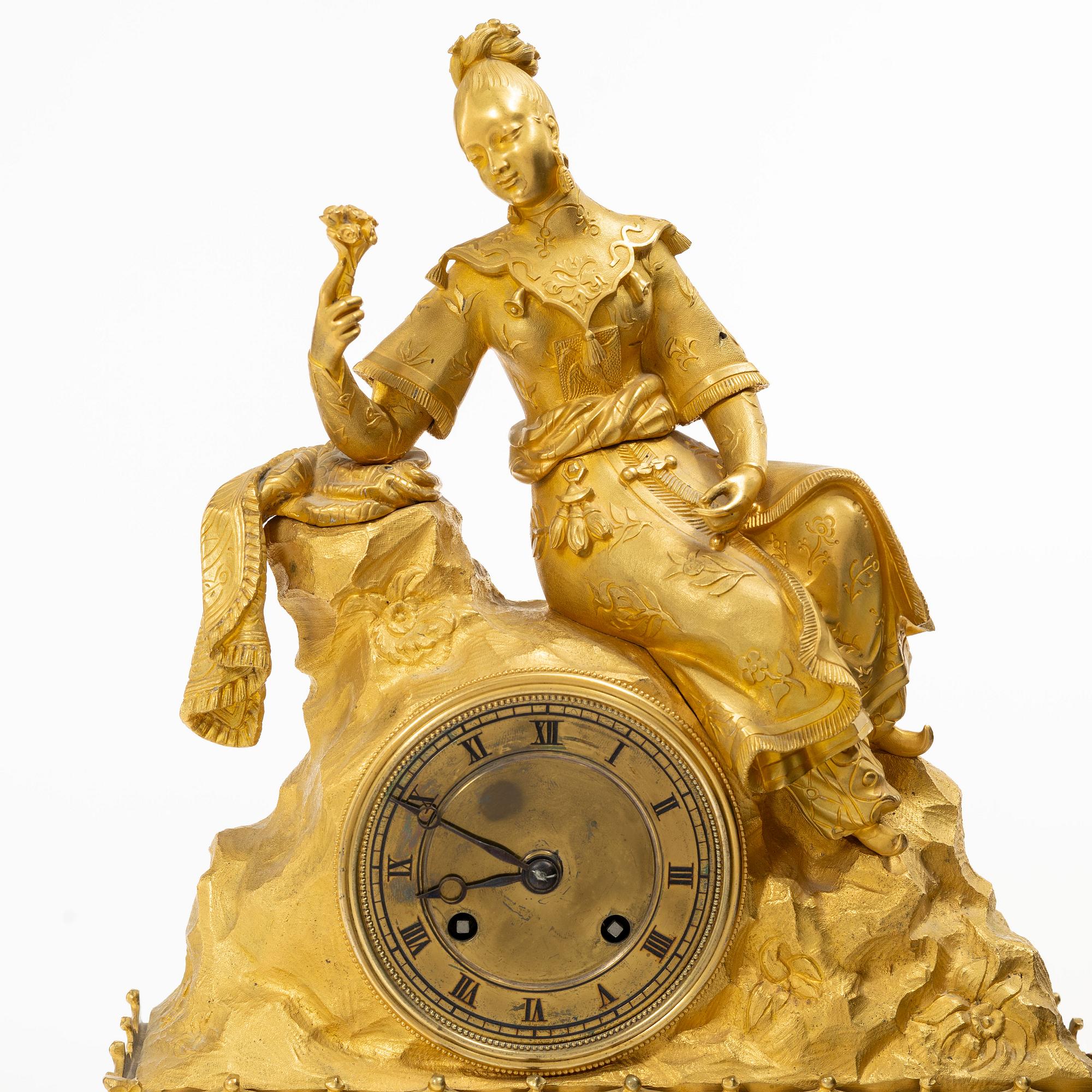 A Late Empire table clock, 19th century.
