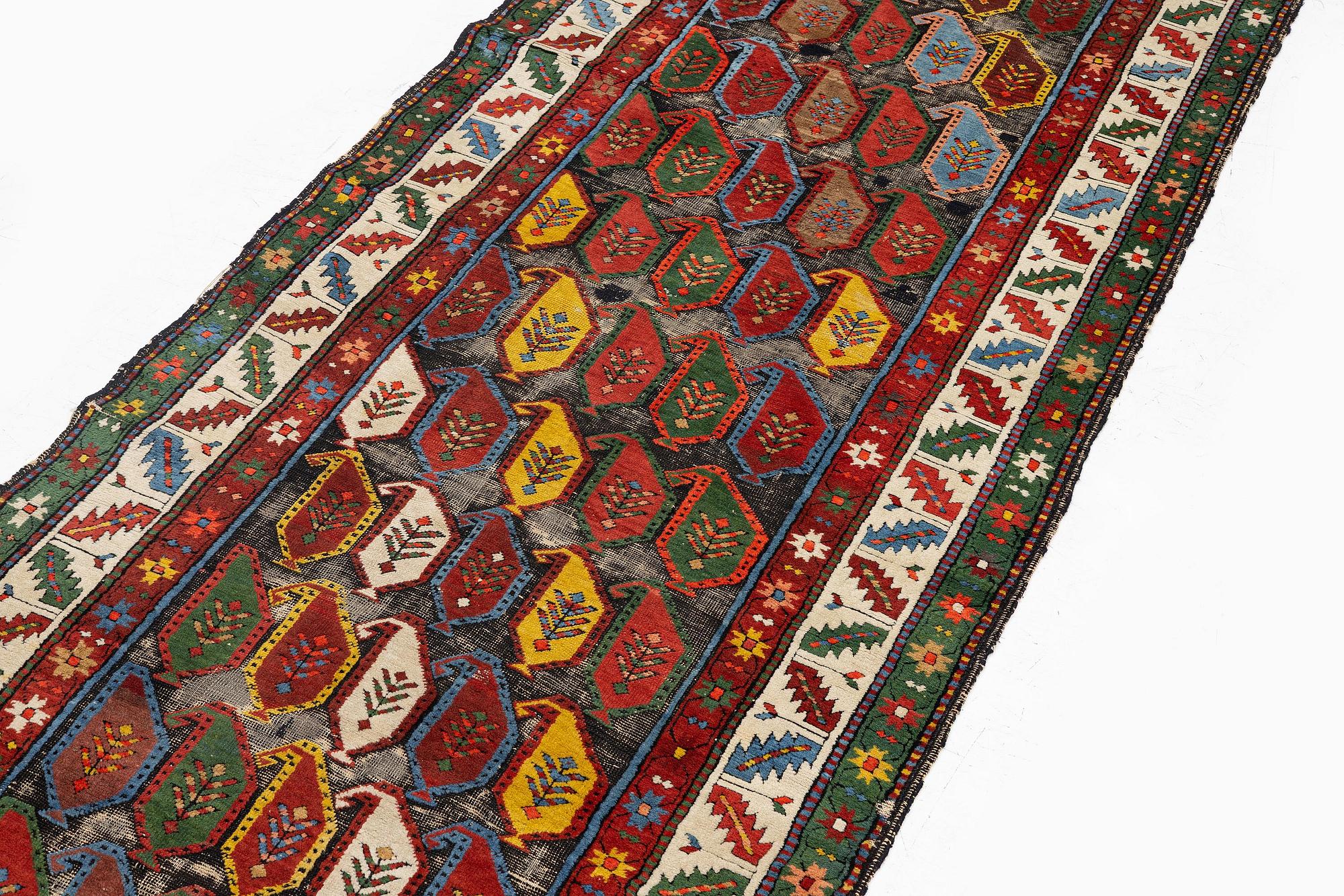 A Kazak runner, southern Caucasus, c. 530 x 110 cm.