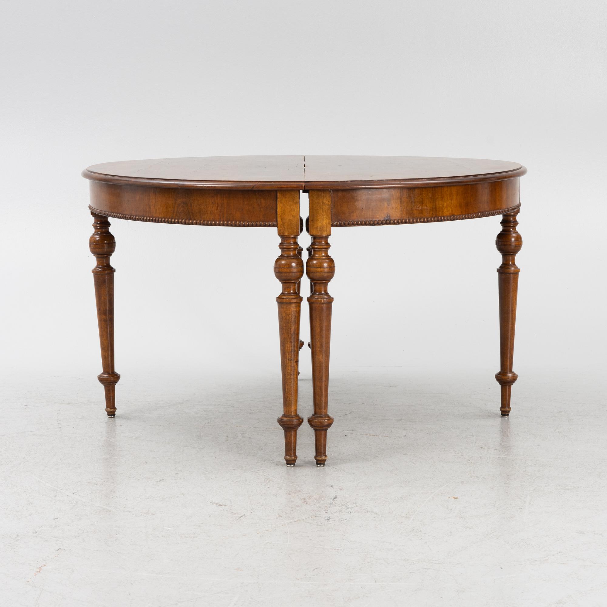 A dining table, late 19th Century.
