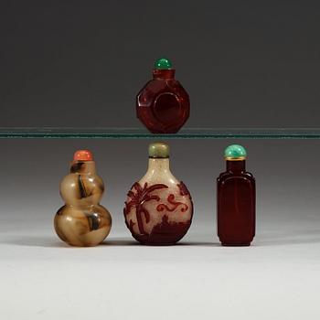 Four Chinese glass snuff bottles, circa 1900.