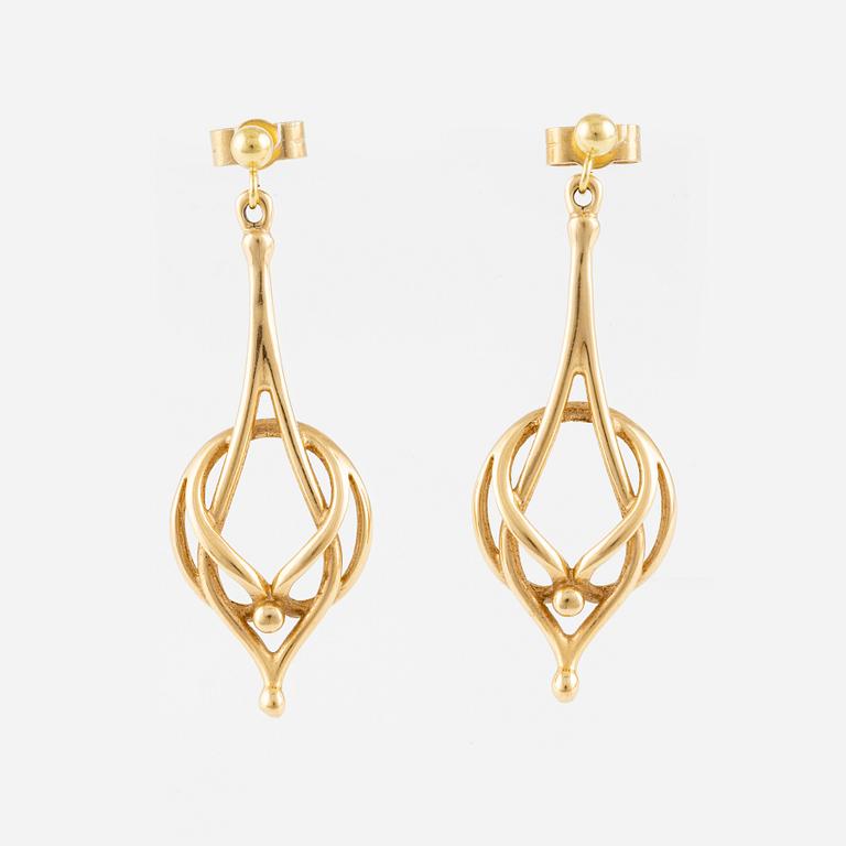 A pair of 18K gold earrings.