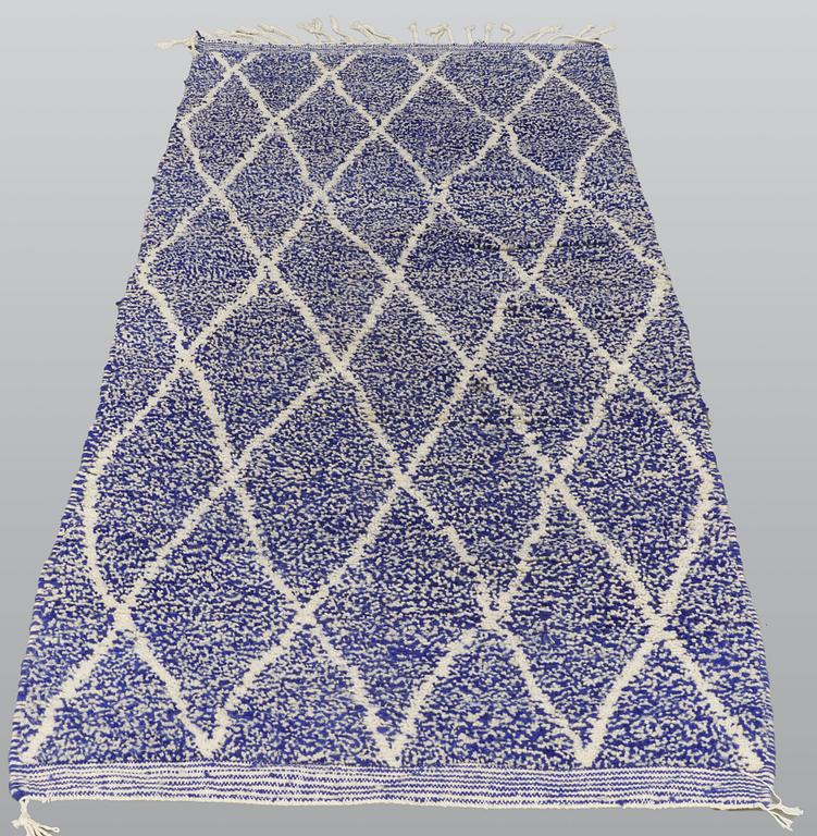 A carpet, Morocco, ca 240 x 104 cm.