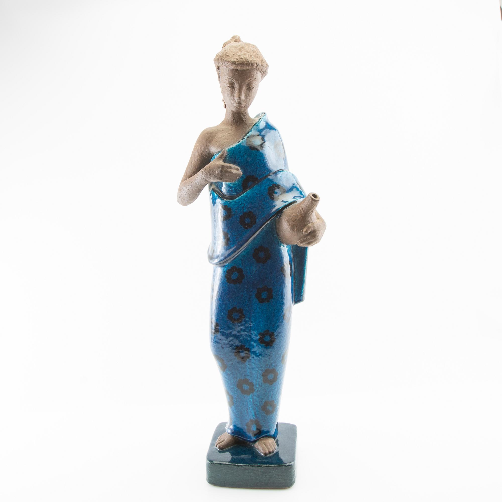 Johannes Hedegaard, figurin signerad och numrerad 38/50 Royal Copenhagen Danmark.