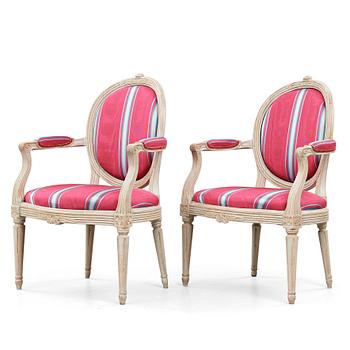 69. A pair of Gustavian late 18th century armchairs by Erik Öhrmark (master in Stockholm 1777-1814).