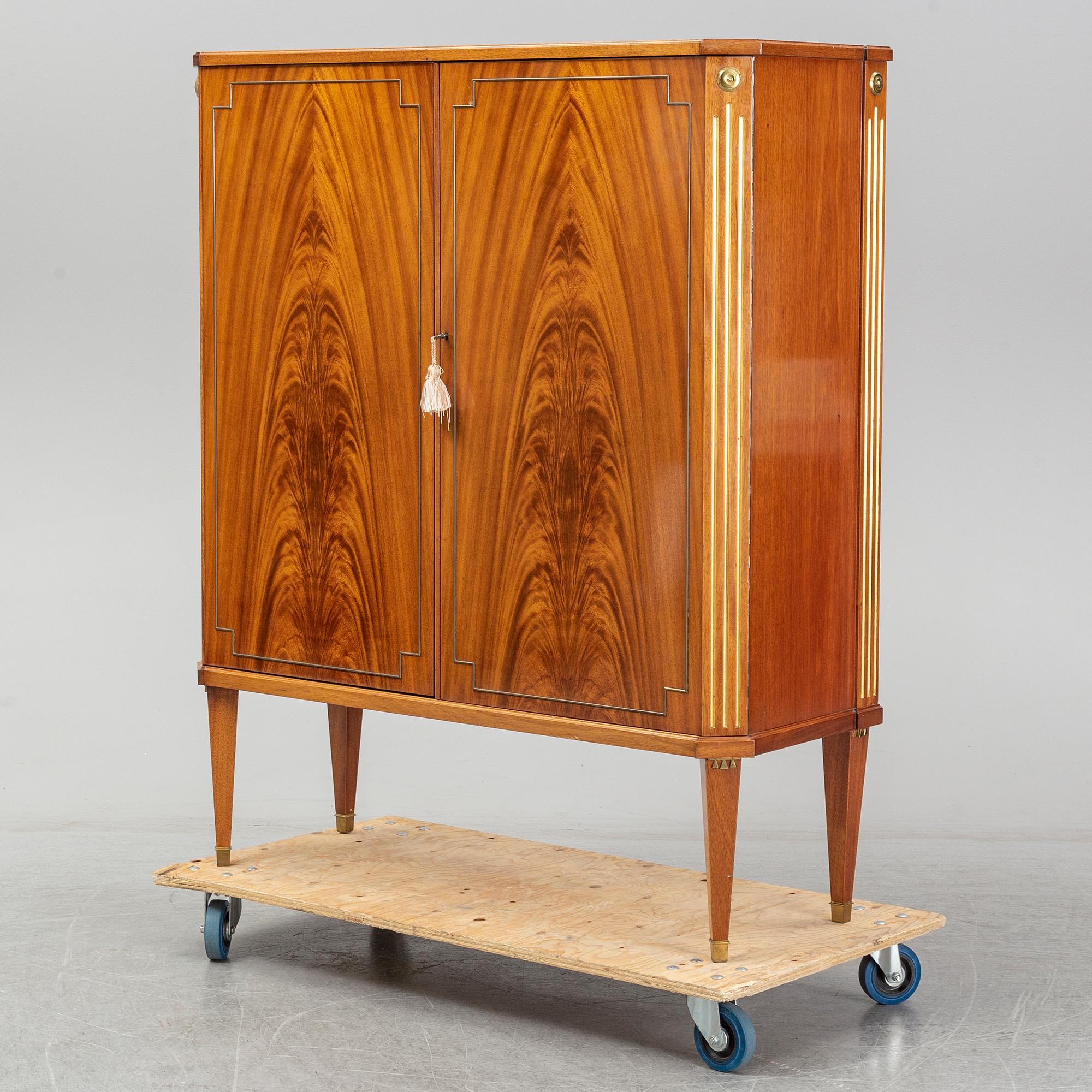 A mid 20th century mahogany veneered cabinet, Bodafors.