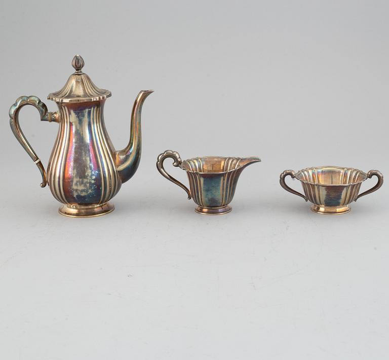 A silver coffee set and a tray, maker's mark Carl Hoff, Helsingborg, Sweden 1934 and 1933,
