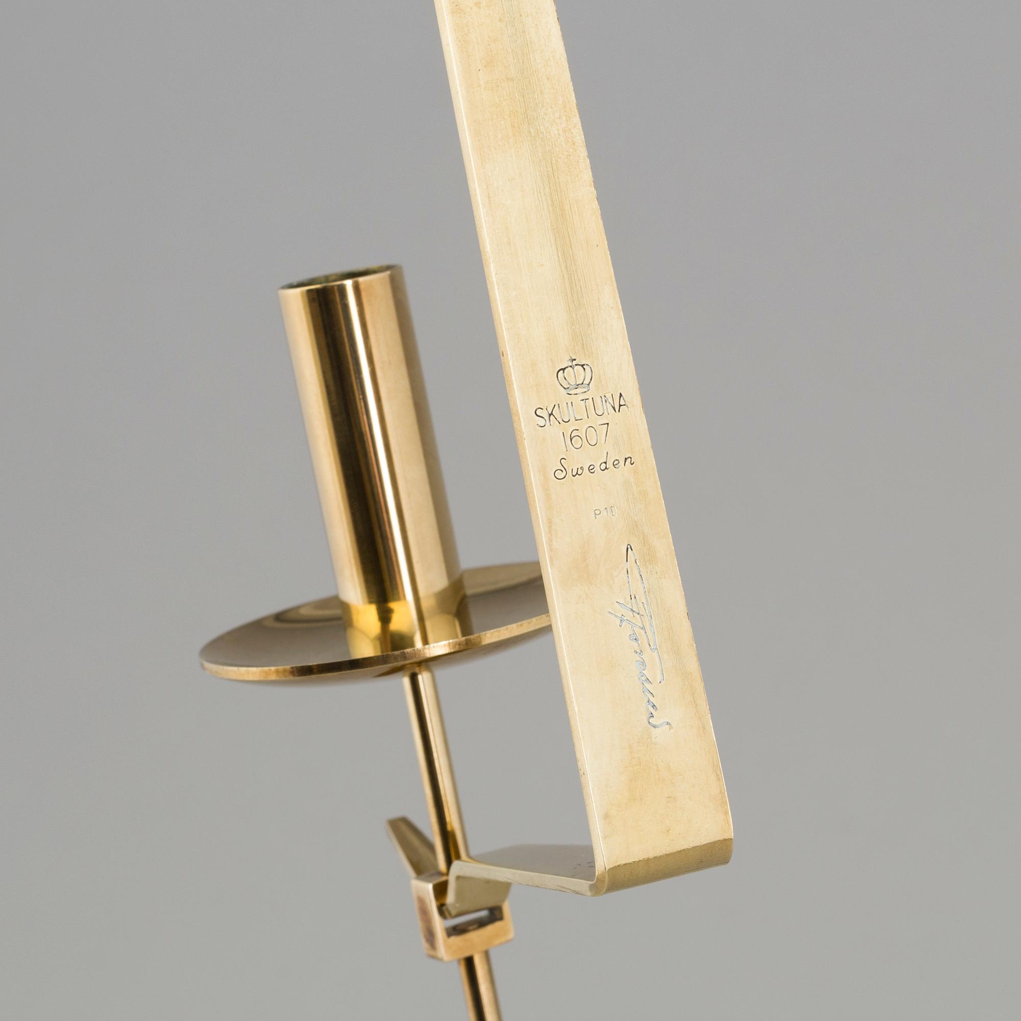 A pair of 20th century brass wall candleholders "Pendel" design Pierre Forssell for Skltuna, Sweden.