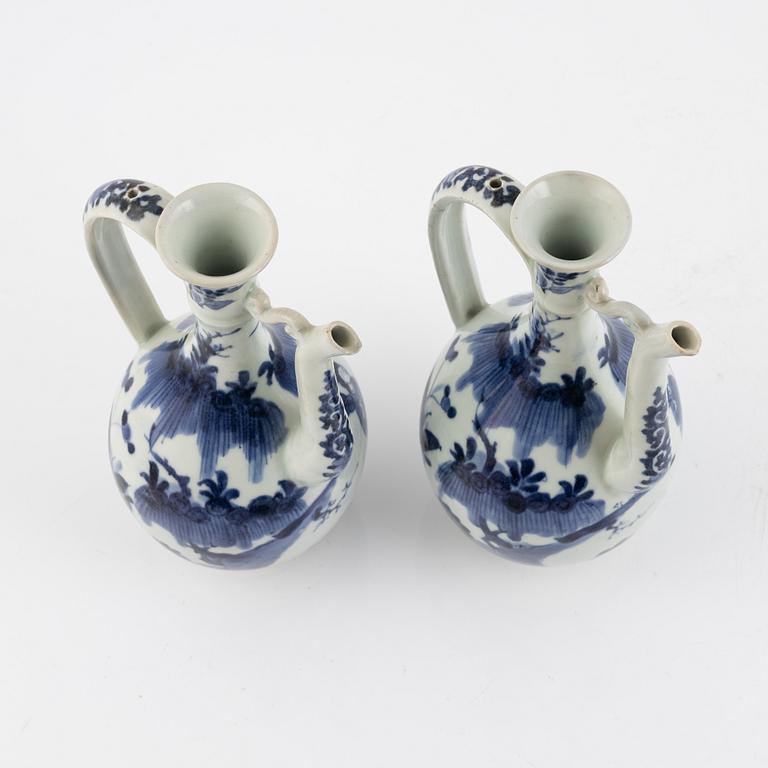 A pair of Japenese blue and white ewers, probably Meiji (1868-1912).