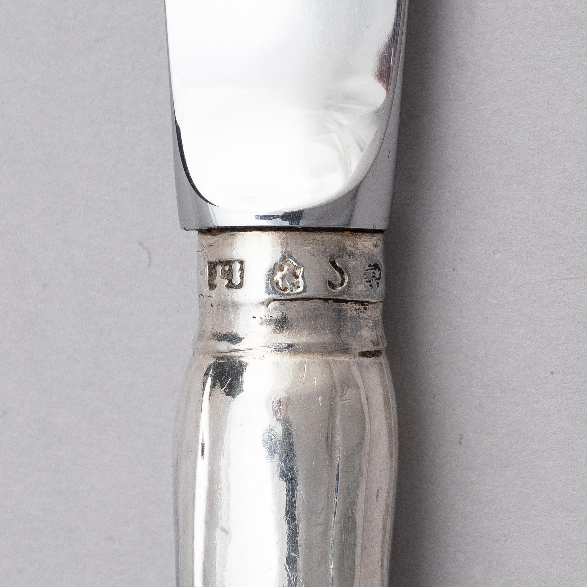 A Swedish set of 24 piece silver table-cutlery, marks of  Isak Trybom, Stockholm 1766-1783.