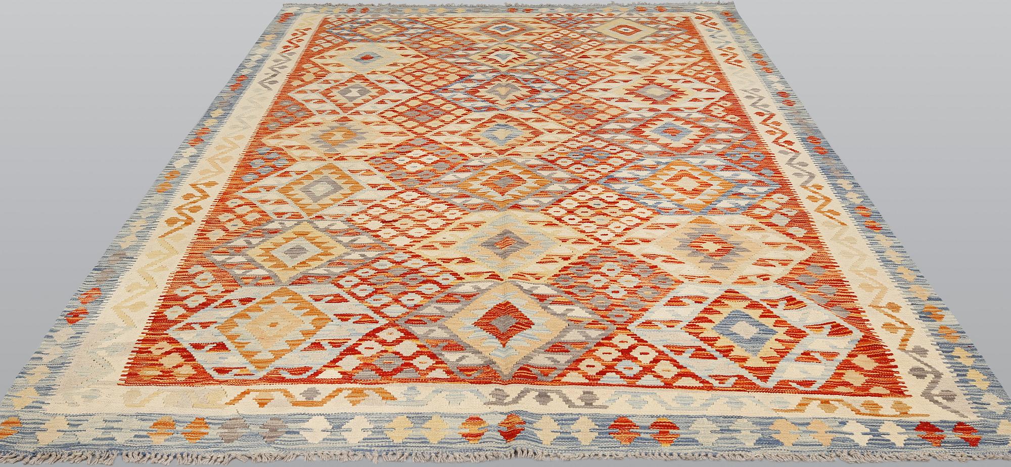 A Kilim carpet, ca 290 x 215 cm.
