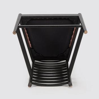 Charles Rennie Mackintosh, a 'Hill house 1' chair for Cassina, designed in 1902.