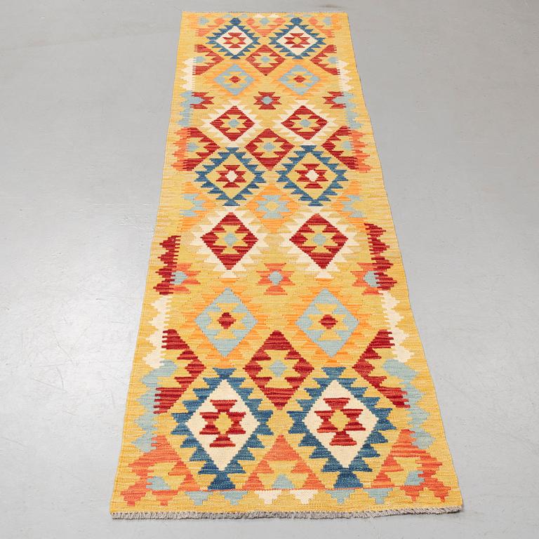A runner, kilim 302 x 82 cm.