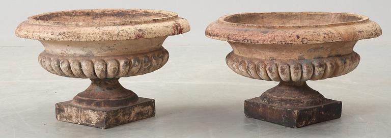 A pair of English 19th century stoneware garden urns.