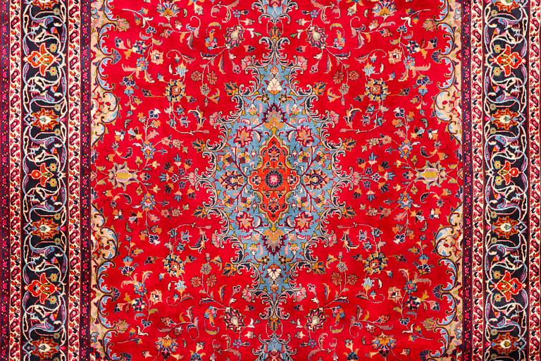 A Keshan carpet, c. 360 x 250 cm.