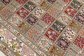 A part silk Moud rug, approx. 250 x 199 cm.