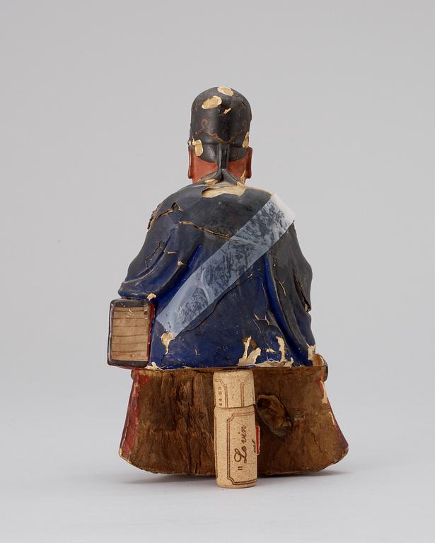 A polychrome wood figure, late Qing dynasty (1644-1912).
