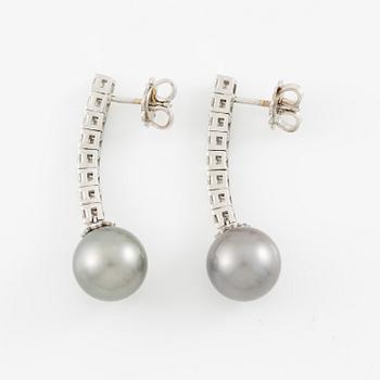 Earrings 14K white gold with cultured Tahitian pearls and brilliant-cut diamonds.