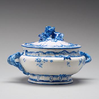 A large Swedish Marieberg faience tureen with cover, dated 27/10 (17)63 decorator signature Erik Aspegren.