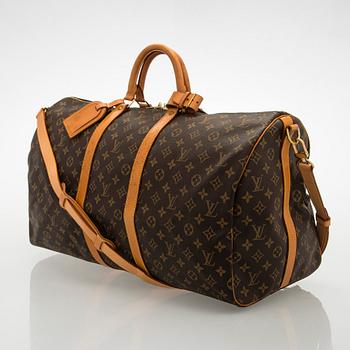 Louis Vuitton, a Monogram Canvas 'Keepall 55 Bandoulière' weekend bag.
