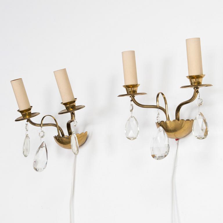 Four of mid-20th century wall sconces.