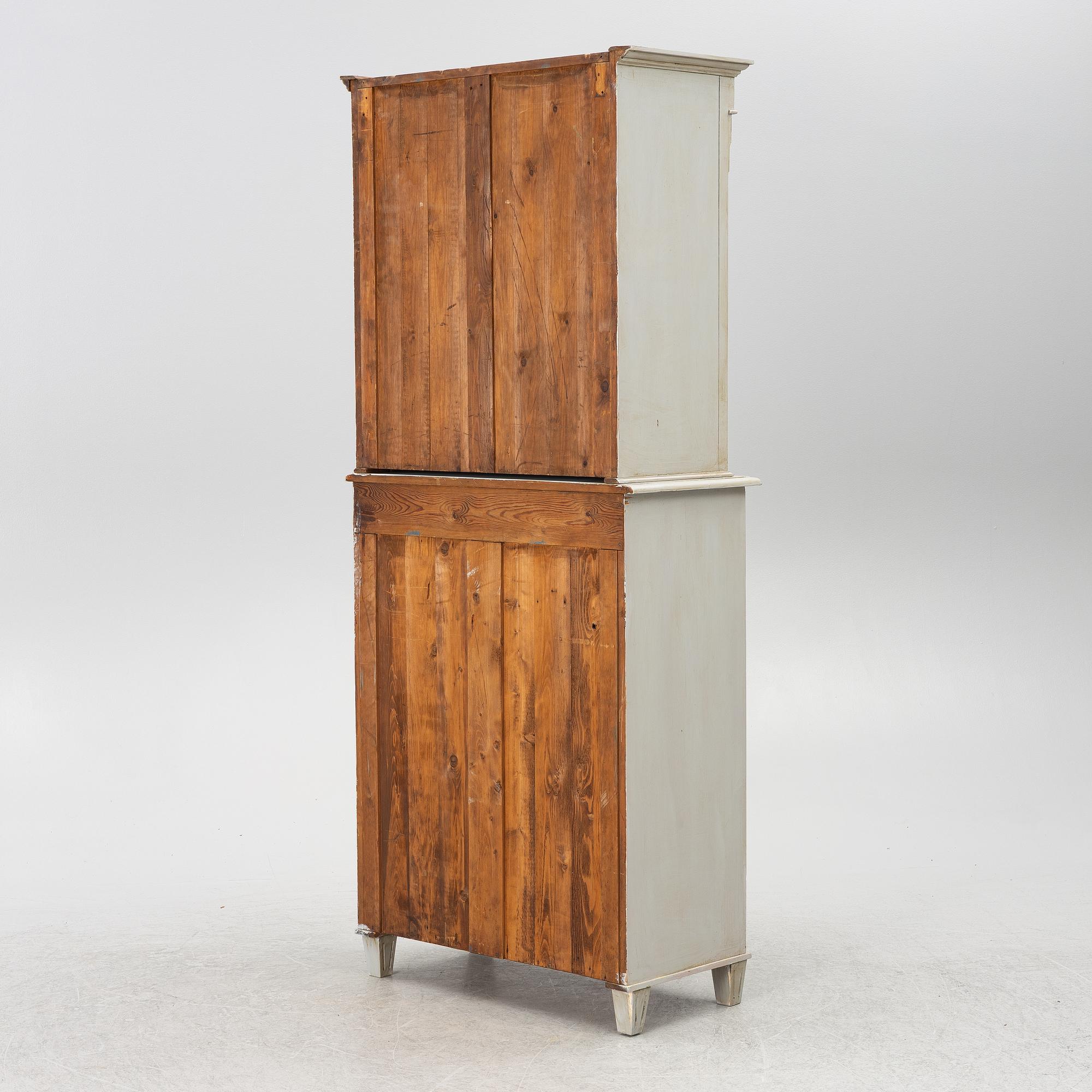 A display cabinet, early 20th century.