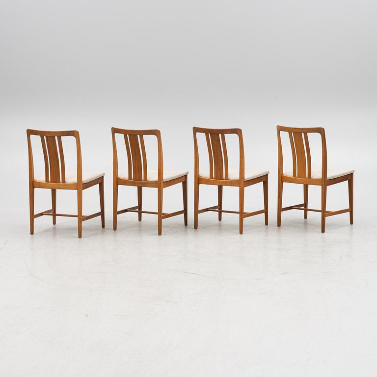 Four walnut chairs, AB Linde Nilsson, Lammhult, Sweden, second half of the 20th century.