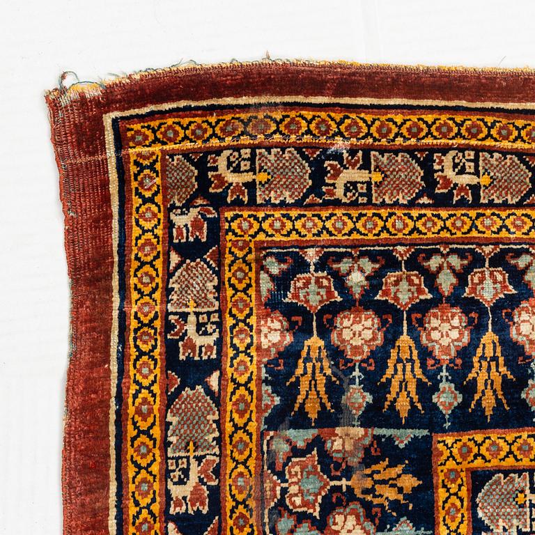 A rug, antique, silk Heriz, ca 166,5-170 cm x 116-120 cm.