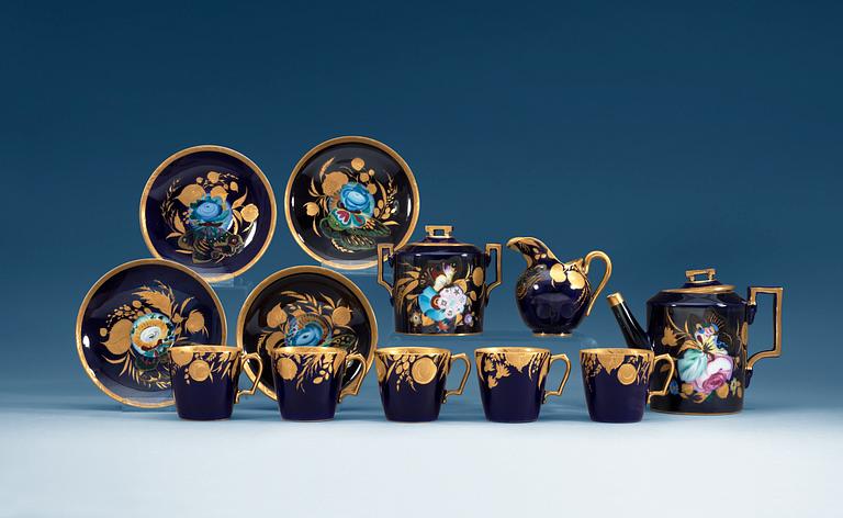 A Russian Coffee service decorated in the 1920's on pieces from the Imperial porcelain manufactory. Signed Z. Kobyletskaya. (7 pieces).