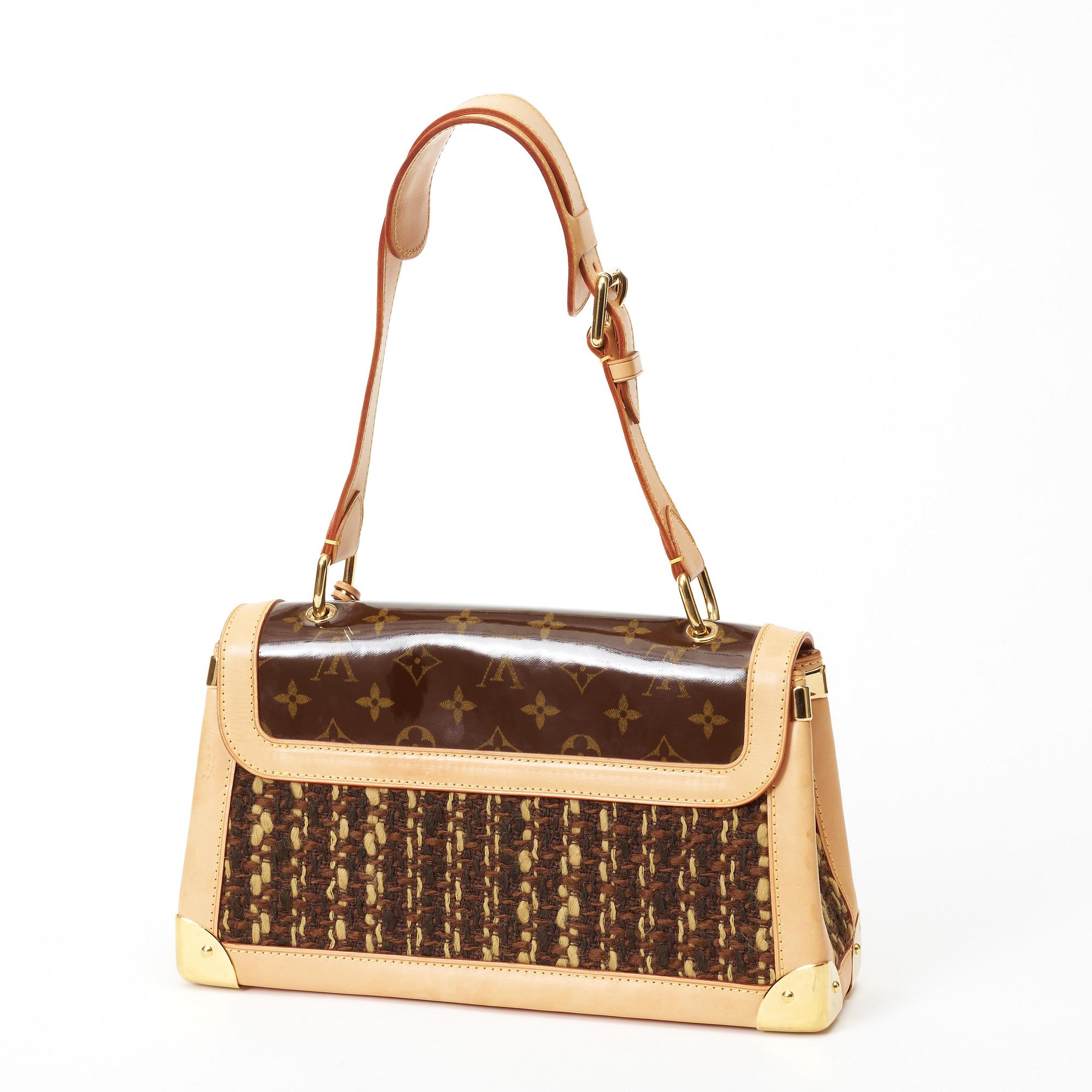 A vernis monogram canvas handbag by Louis Vuitton,