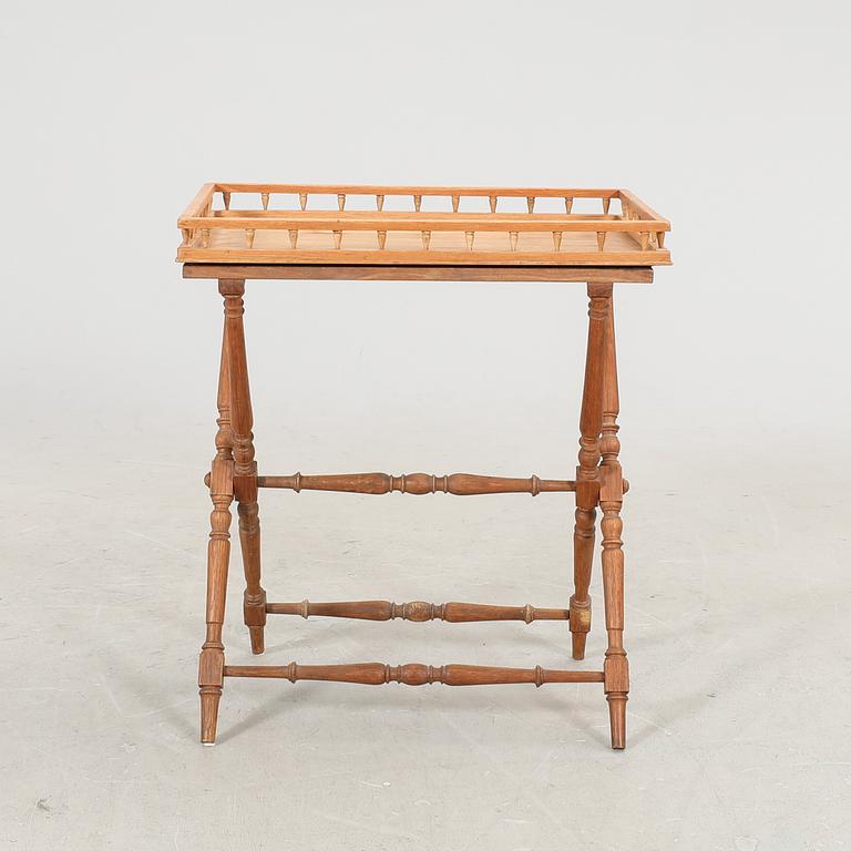 An oak tray table around 1900.