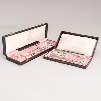 Silver serving cutlery, three with mark of Ferdinand Timper, Helsinki 1901-02 and a pair with German marks, ca. 1900.