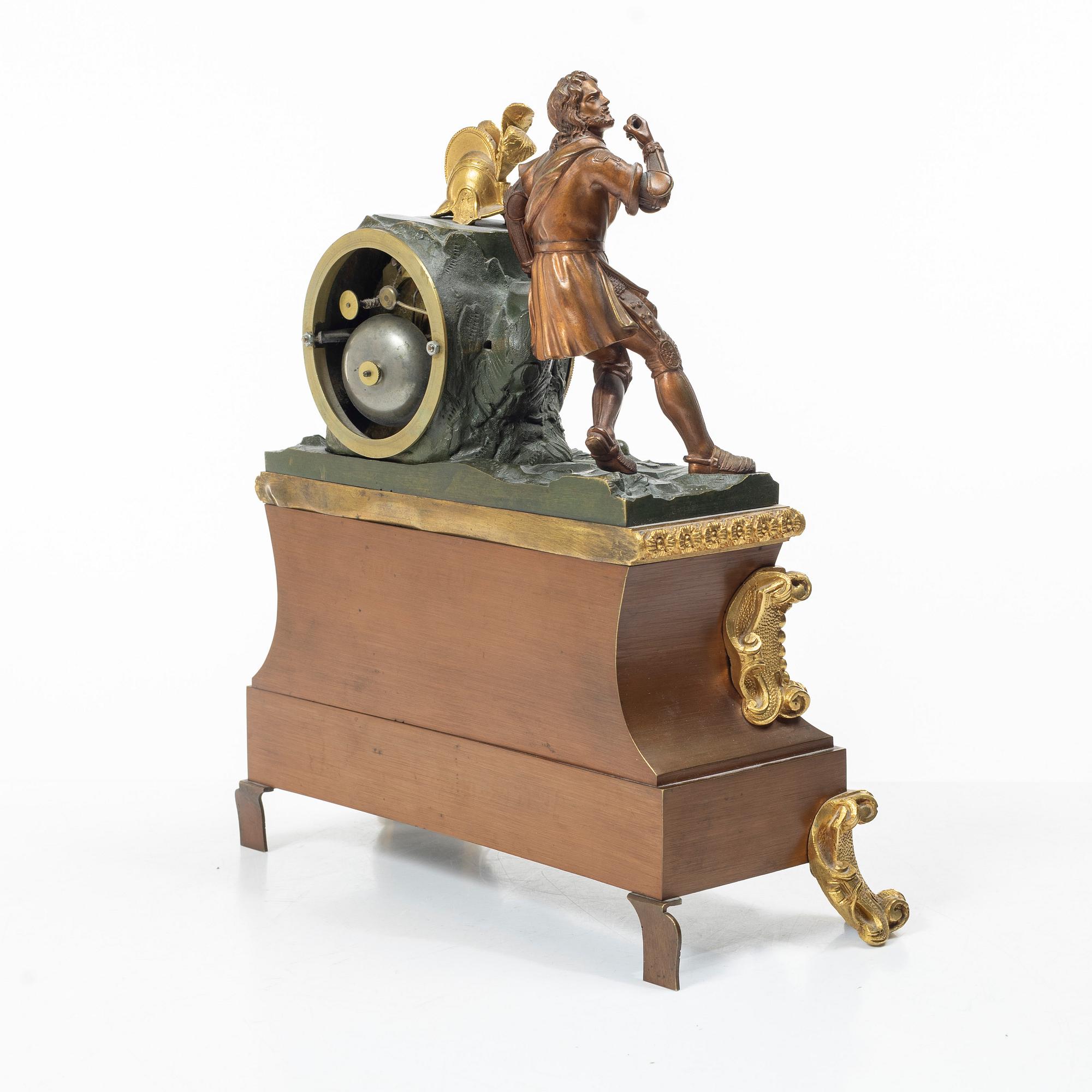 A mantel clock, France, early 20th Century.