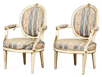 856. A pair of Gustavian armchairs.