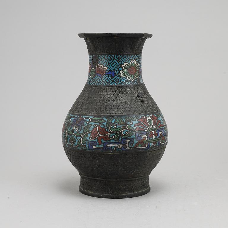 A Chinese bronze and cloisonné vase, around the year 1900.