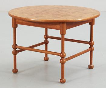 A Josef Frank mahogany and burrwood table, Svenskt Tenn, model 1028.