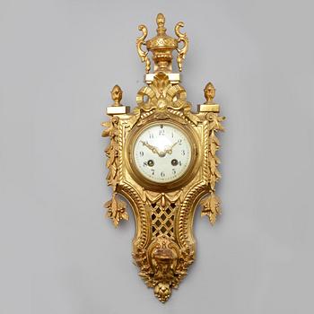 A wall clock in Louis XVI style with clockwork by Japy Frères & Cie, made around year 1900.