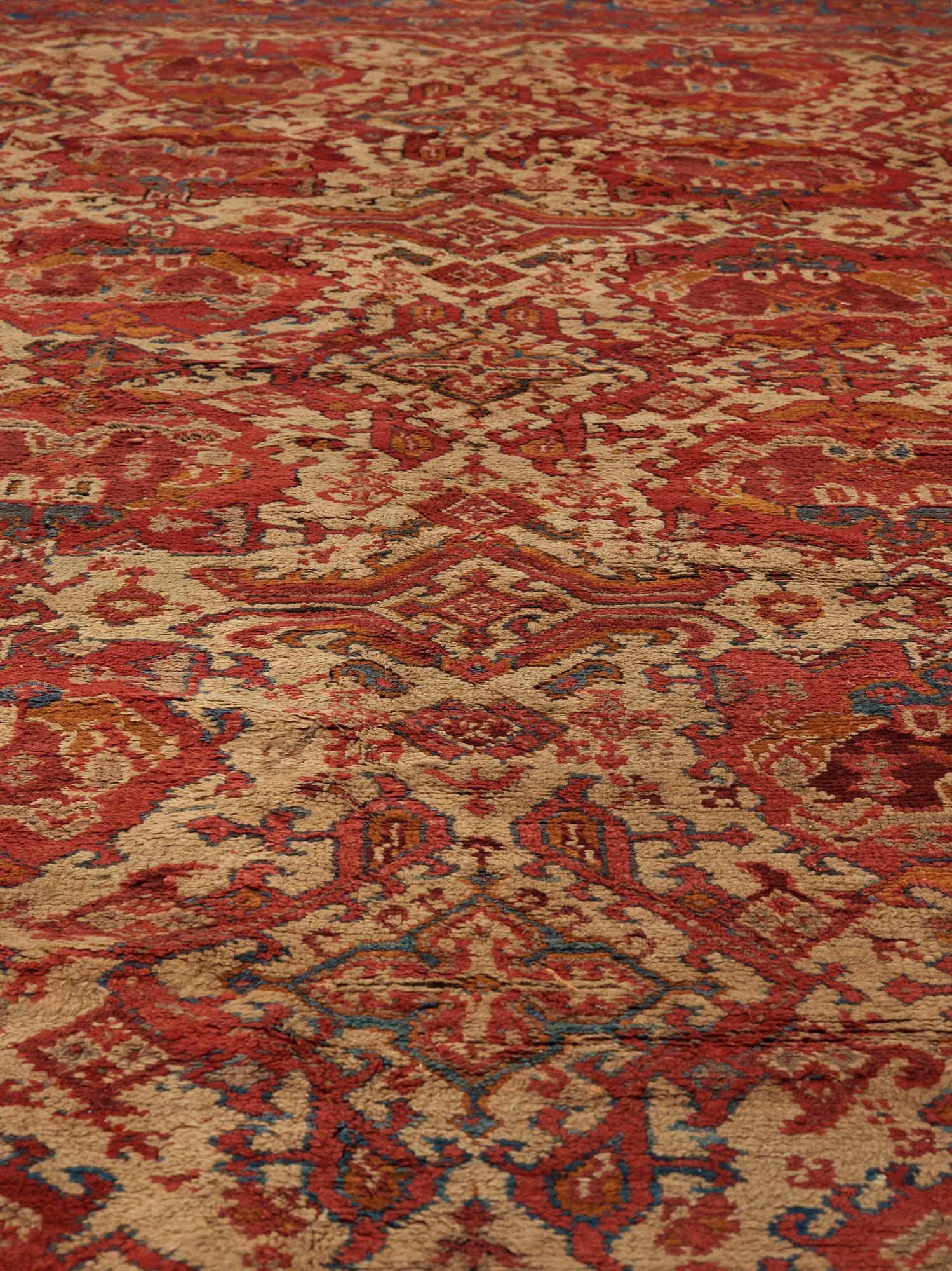 A CARPET. An antique Ushak. 554,5 x 480 cm.