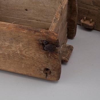 Four handcrafted wooden tins, 19th century.