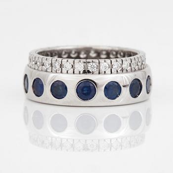 RING, 14K vitguld med safirer totalt ca 3.32 ct och diamanter totalt ca 0.48 ct. Vikt 11,2 gram.